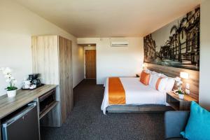 Letto o letti in una camera di Mision Express Durango