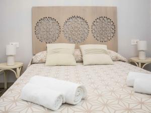 Ένα ή περισσότερα κρεβάτια σε δωμάτιο στο Apartamentos Rurales Parajes de Piedra