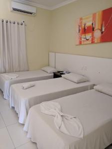 Postel nebo postele na pokoji v ubytování Hotel Capuchins