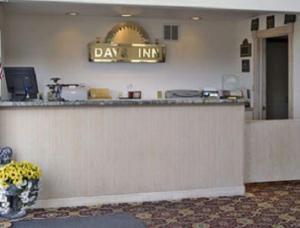 a bar with a sign that reads day inn at Days Inn by Wyndham Fort Stockton in Fort Stockton