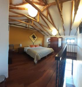 En eller flere senge i et værelse på ViaVia Cafe Ayacucho
