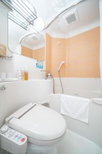 Een badkamer bij Super Hotel JR Fujiekimae Kinenkan