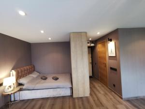 Cama o camas de una habitación en Cool Apartments