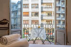 Balkón nebo terasa v ubytování HiHome Hostel Uría
