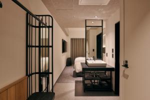 ibis Styles Nagoya房間的床