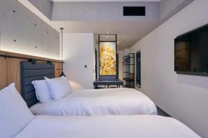 ibis Styles Nagoya房間的床