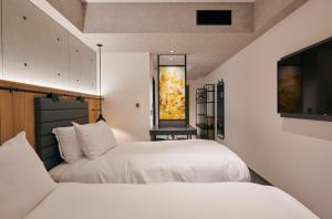 ibis Styles Nagoya房間的床