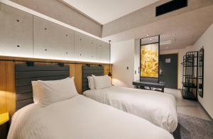 ibis Styles Nagoya房間的床