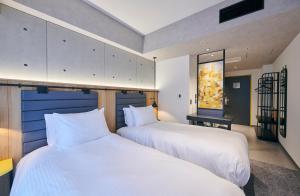 ibis Styles Nagoya房間的床