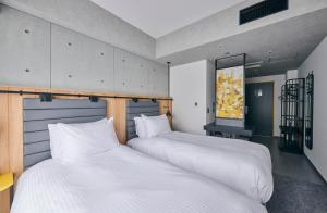 ibis Styles Nagoya房間的床