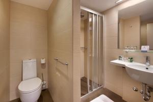 Een badkamer bij Hotel Materada Plava Laguna