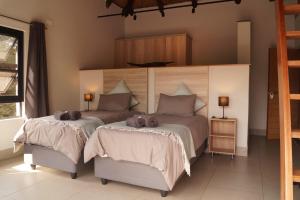 Postel nebo postele na pokoji v ubytování Uchawi wa Afrika + 40 fotografií