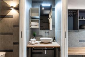 Kylpyhuone majoituspaikassa SEI Garda Apartments
