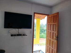 TV a/nebo společenská místnost v ubytování Pousada Bergehaus
