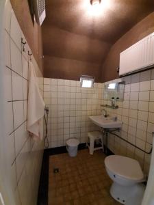 Koupelna v ubytování Hoeve de Laan