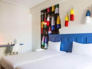 Кровать или кровати в номере Ibis Styles Lisboa Centro Liberdade NE