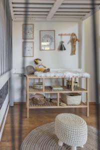 A seating area at Goger Apartman