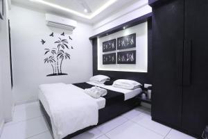 Postel nebo postele na pokoji v ubytování Hotel Paramount Inn