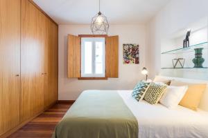 Posteľ alebo postele v izbe v ubytovaní Alfama Design Villa