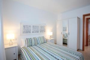 A bed or beds in a room at A3 BUNGALOW