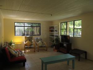 Posezení v ubytování Camping & Hospedaje Rio Laja
