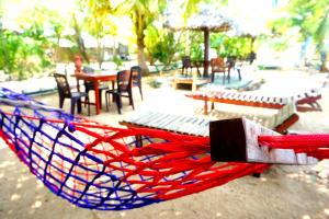 
Ein Restaurant oder anderes Speiselokal in der Unterkunft Star Rest Surf Camp Arugambay 
