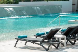 Bazén v ubytování L'Azure Hotel 4* Sup nebo v jeho okolí