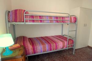 A bed or beds in a room at Nettuno 137D
