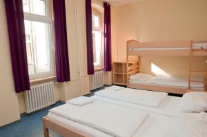 Postel nebo postele na pokoji v ubytování Happy Hotel Berlin