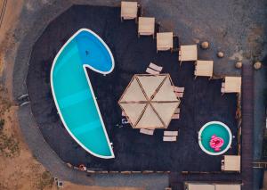 an overhead view of a swimming pool and a beach at Keros Blue - Luxury in Wilderness in Kalliópi