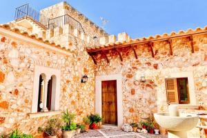 Fotografia z galérie ubytovania Es Castell de Ca n'Alou de Ses Cases Noves v destinácii S'Horta