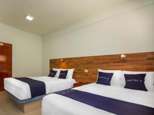 Postel nebo postele na pokoji v ubytování Hotel Pejelagarto