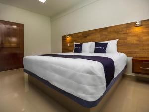 Postel nebo postele na pokoji v ubytování Hotel Pejelagarto