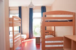 Postel nebo postele na pokoji v ubytování Happy Hotel Berlin