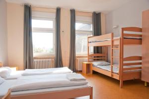 Postel nebo postele na pokoji v ubytování Happy Hotel Berlin