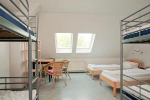 Postel nebo postele na pokoji v ubytování Happy Hotel Berlin