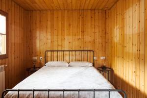 Postel nebo postele na pokoji v ubytování El Refugi de les Basses