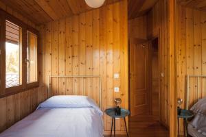 Postel nebo postele na pokoji v ubytování El Refugi de les Basses
