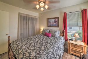 a bedroom with a bed and a window at Fredericksburg Home - 8 Blocks to Main St and Wineries in Fredericksburg