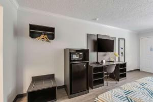 TV a/nebo společenská místnost v ubytování Motel 6-Kilgore, TX