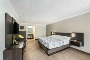 Postel nebo postele na pokoji v ubytování Motel 6-Kilgore, TX