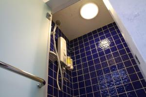 Vonios kambarys apgyvendinimo įstaigoje Layang Layang Guest House Melaka