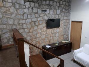 TV a/nebo společenská místnost v ubytování Pousada TRUFFIMAR Ilhabela
