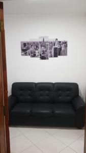 A seating area at Apartamento 2 dorm na Guilhermina com tudo novo, Localização Incrível! Internet 200 MB