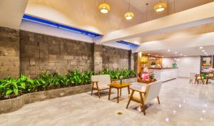 Posezení v ubytování Grand Lee Hotel