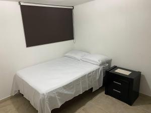 Кровать или кровати в номере Posada fresno +8 фотографий