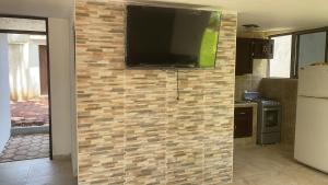 Телевизор и/или развлекательный центр в Posada fresno