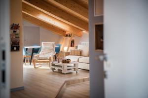 Posezení v ubytování Loft 29 mansardato con ampio terrazzo