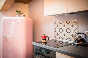 Kuchyň nebo kuchyňský kout v ubytování Loft 29 mansardato con ampio terrazzo