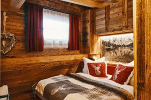 Posteľ alebo postele v izbe v ubytovaní Chalet Zugspitztraum